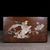 This is a beautifully crafted rectangular wooden box featuring intricate mother-of-pearl (nacre) inlay work on the lid....