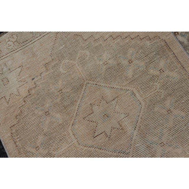Vintage Turkish Oushak Runner With Soft Earth Tones and Geometric Star Motifs For Sale - Image 10 of 10