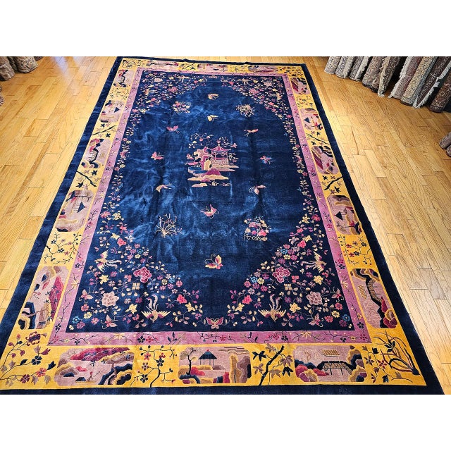 A magnificent and oversized example of an early 20th-century Walter Nichols Art Deco Chinese rug—truly one of the most...