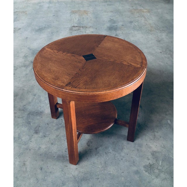 Vintage Art Deco Design Round Side Table. Made in Belgium, 1930's period. Solid oak constructed with veneer inlay on the...