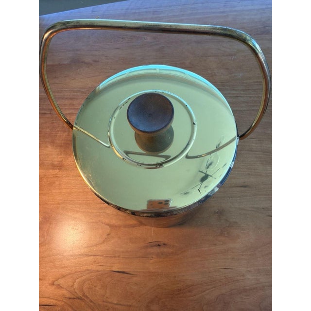 Vintage Gessner Mid-Century Modern Ice Bucket. Features a stylish tortoise shell patterned vinyl exterior, brass-finished...
