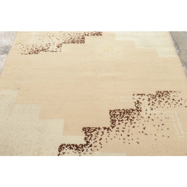 Hand-knotted in wool, circa 1940-1949, this 5x6 vintage rug is a striking, avant-garde addition to Rug & Kilim’s Vintage...