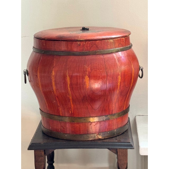 A beautifully sculptural antique Chinese wooden storage vessel, hand crafted from solid elm (or a closely related...