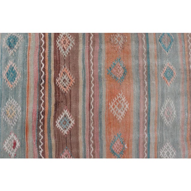 Mid 20th Century Mid 20th Century Vintage Turkish Gallery Kilim With Stripes and Tribal Motifs in Muted Tones For Sale - Image 10 of 13