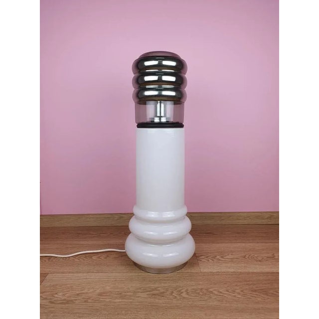 Extremely rare floor lamp produced in the 1960s by Peil & Putzler. It is probably the only copy available on the Internet....