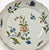 A gorgeous antique 18th-Century faience polychrome plate from the south-west region of France. This charming plate has...