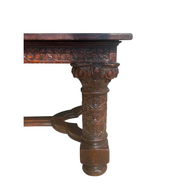 Gothic Revival Oak Draw Leaf Dining Table with a rectangular top with two pull out extensions. The top in a parquet...