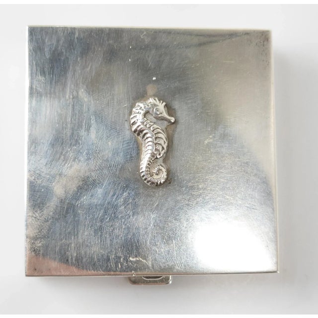 We are selling this fine quality American sterling silver makeup compact. This cosmetic case has interior with makeup...