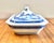 Chinoiserie blue and white porcelain tureen, possibly 19th-century, featuring the classic "Canton pattern," depicting a...