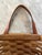 Vintage Longaberger wall hanging basket with leather handle. Split wood construction with decorative & functional nails....