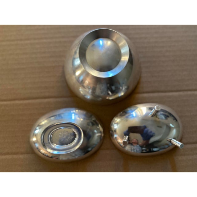 A wonderful trio of (3) Danish Midcentury Modern silver plated dishes, designed by Carl F. Christiansen. Christiansen was...
