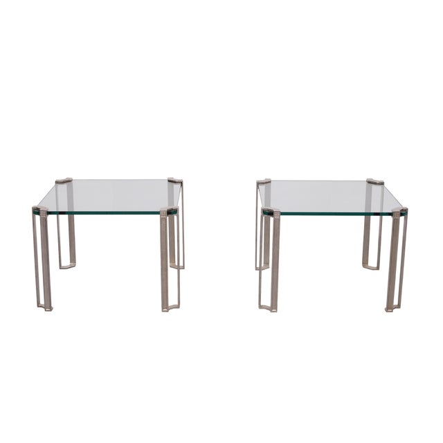 Beautiful pair of sofa tables ,Manufactured by Peter Ghyczy . Top quality ,thick Cut Glass Tops , Nickel on Brass ,so...