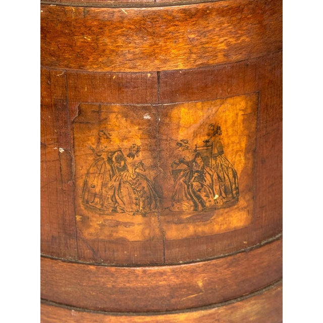 A handsome antique staved wood firkin or utility bucket dating to the mid-to-late 19th century. Constructed in the...