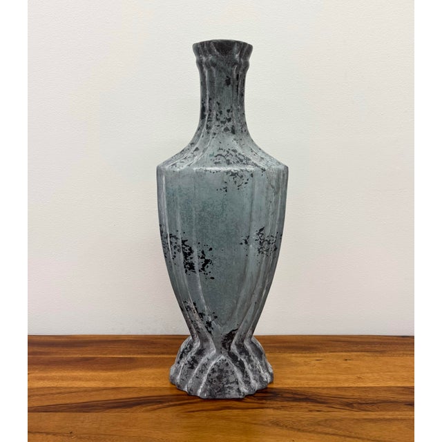 A striking vintage sculptural ceramic vase featuring a bold architectural silhouette inspired by Art Deco design with...