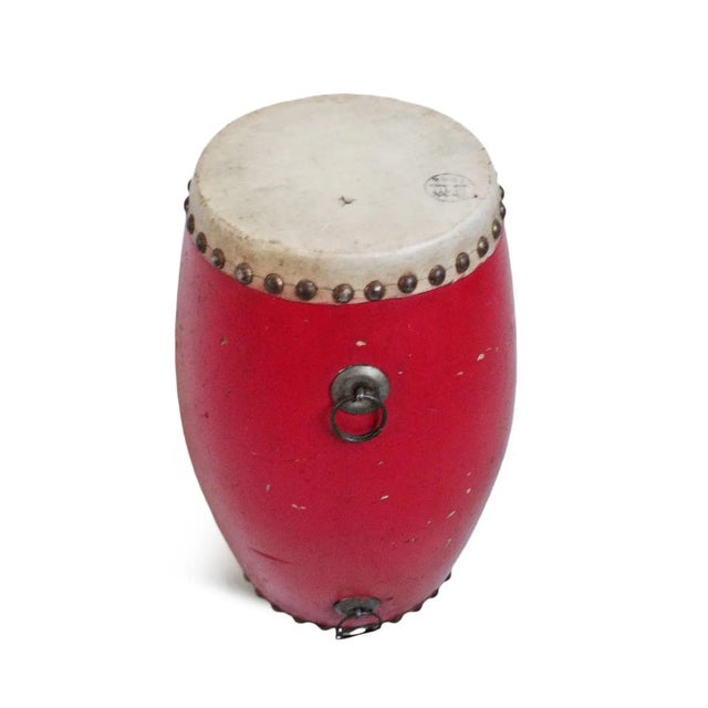 Original red painted small wood drum from Tibet. Iron rings and rivet details. Nice sound and can be used as decoration or...