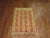 Fascinating early 20th century Turkish Melas carpet in bright yellow and bright red. The vertical design was cleverly...