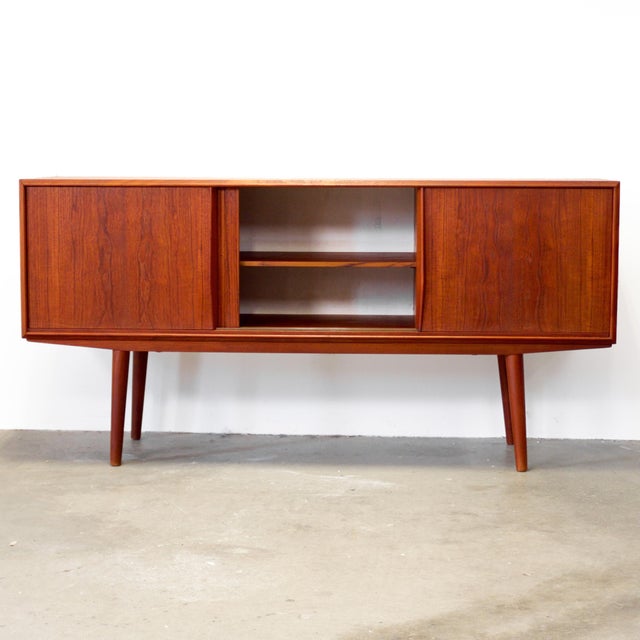 Dimensions: 65" L x 17 5/16" D x 31 7/8" H Origin: Denmark Designer: EW Bach Manufacturer: Sejling Skabe Year: ca 1950s...
