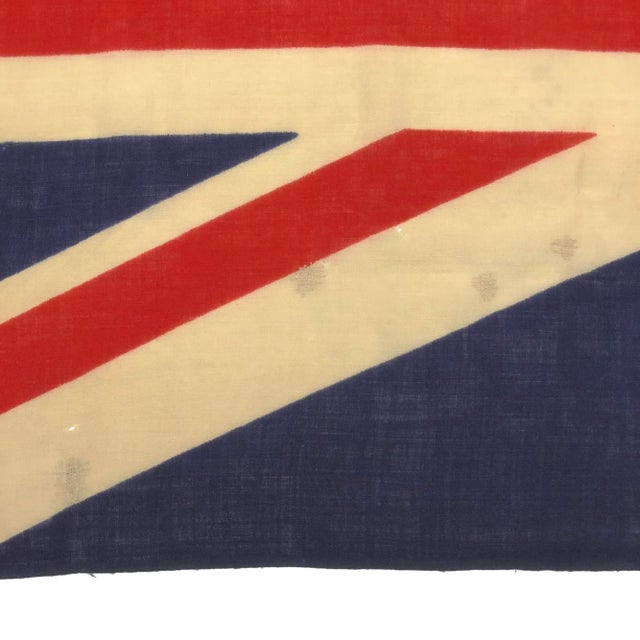 This vintage Union Jack flag is made from a wool cloth, with printed design visible on both sides. Please note small...