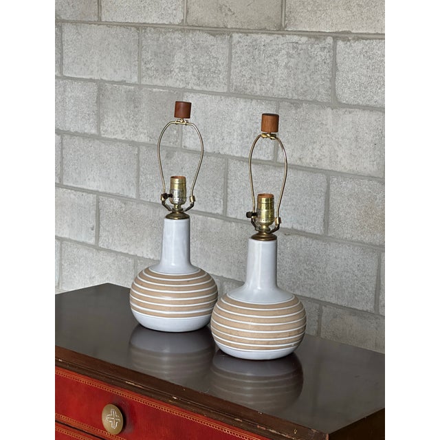 Beautiful lamps designed by famed ceramicist duo Jane and Gordon Martz. Nice neutral palette with flat white and unglazed...