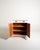 Original Scandinavian vintage sideboard with two hinged doors and two drawers. The white painted wood and the golden metal...