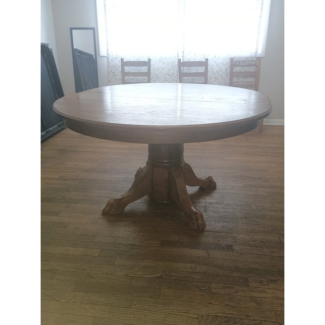 Antique Round Oak Pedestal Dining Table With Claw Feet Dating From the Late 19th to Early 20th Century. For Sale - Image 13 of 14