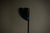 Postmodern floor lamp manufactured by Relco Milano in Italy during the 1980s. The piece features a heavy cast iron base...