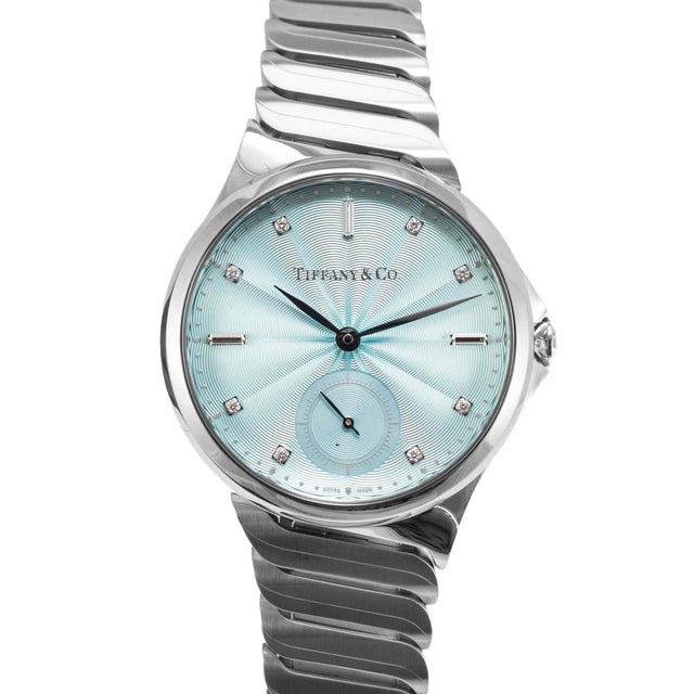 Brand: Tiffany &amp; Co. Gender: Ladies Metal Type: Stainless Steel Diameter: 34.00 mm Weight: 97.36 grams TIFFANY & CO....