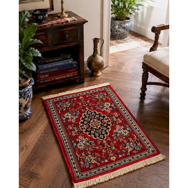 This small-sized Persian Qum (Qom) rug is crafted according to the manufacturing tradition of the famous Iranian city of...