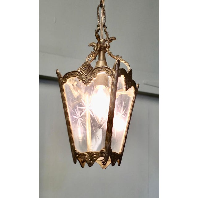 Petite French Rococo Style Lantern Hall Light A superb quality brass lantern, the light has glass panels etched with stars...