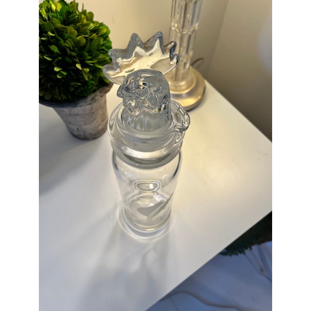 Handsome vintage mid-centry cocktail shaker featuring rooster head stopper and sailfish etching.