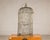 This antique Indian brass bird cage presents a wonderfully sculptural silhouette, with its tall proportions, domed top,...