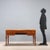 Mahogany desk with mahogany burl trim. Top with green leather insert and rounded edge, side drawers under the top also...