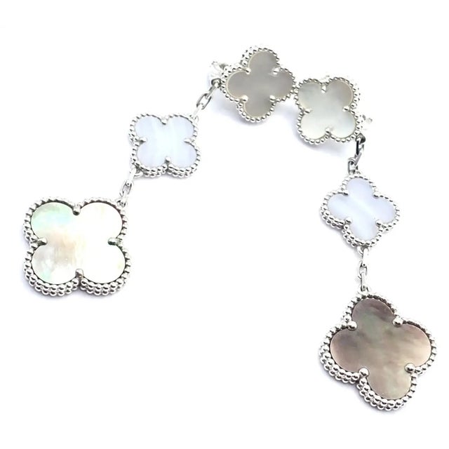 Van Cleef & Arpels 18k White Gold Magic Alhambra MOP Chalcedony Earrings These earrings come with a Van Cleef & Arpels...