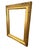 A refined gilt wooden picture frame featuring a broad, beveled profile accented with delicate Art Nouveau-inspired...