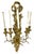 Antique gilt and brass ribbon and musical wall sconce with five arms. Carved gilt ribbon and music themed backplate with...