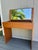 Quality, mid century Danish Modern teak vanity or desk. Flip top mirror with brass ring, pulls open to two sections for...