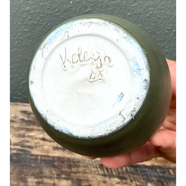 This sophisticated vintage studio pottery vase by the artist Keleigh showcases a masterfully balanced minimalist...
