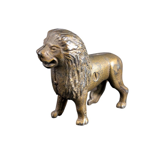 This original AC Williams diecast coin bank has a wonderful patina of gold that has been partially worn through to the...