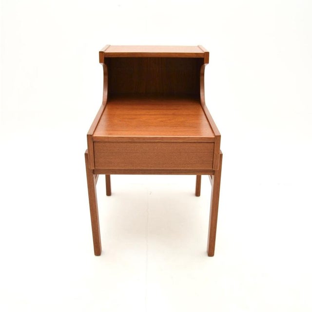 A stylish and extremely well made Swedish vintage teak bedside cabinet / side table. It was made in Sweden by Gustavssons...