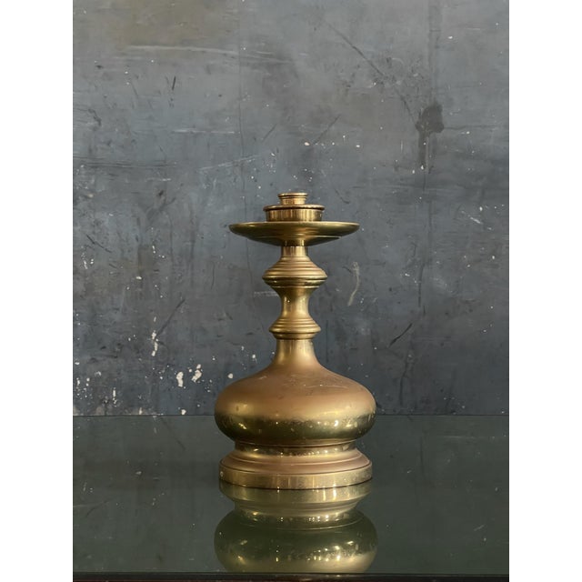 This is a large solid brass candlestick holder designed and made by Maitland Smith Hong Kong. In the style of Northern...