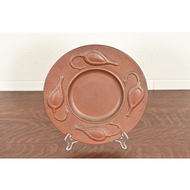 A gorgeous Arts & Crafts hammered copper charger plate or tray In the manner of Roycroft By Ramon Ramirez Mexico, Mid-20th...