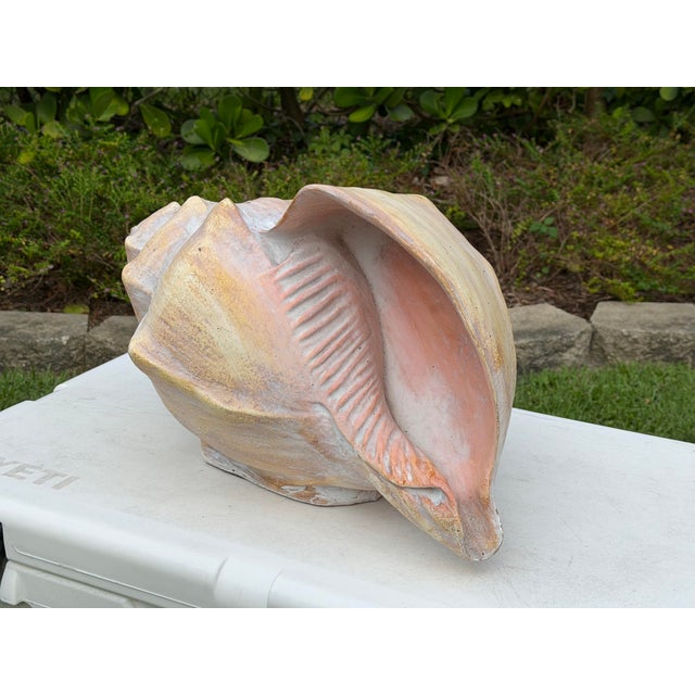 Large vintage decorative conch shell sculpture with a beautifully aged, hand-painted finish in soft ivory, blush, pale...