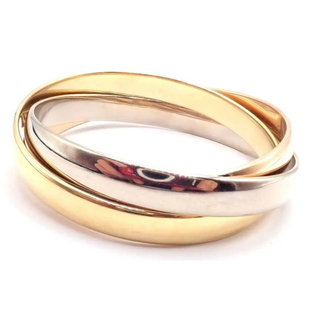 Cartier 1990s Cartier Trinity Rolling Tricolor Gold Large Model Bangle Bracelet For Sale - Image 4 of 9