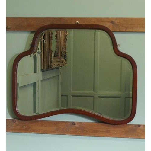 An Attractive Art Deco Walnut Mirror A good Art Deco wall mirror it has a 1” wide unusual shaped frame and a very...
