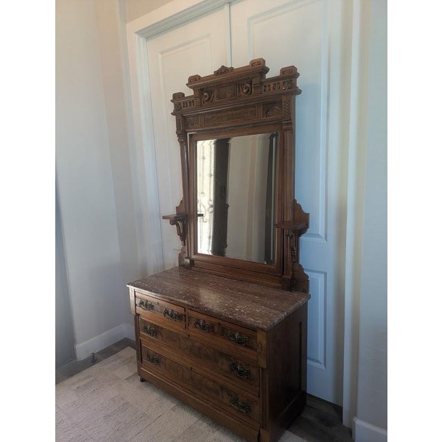 Bring late 19th-century elegance into your home with this stunning Victorian Eastlake style marble-top dresser, circa...