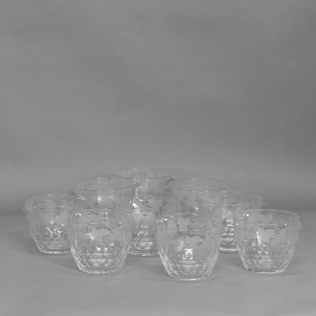 9 wine glass rinsers with etched vine decoration. Circa 1890.