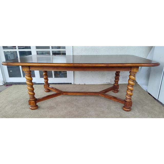 Beautiful large early 1990s refinished walnut dining table in excellent condition. Modeled after early 19th century French...