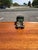 A charming vintage cast iron toy dump truck, beautifully modeled with early 20th-century industrial character and hand-...