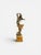 A signed French Art Nouveau figural sculpture depicting a nude female figure in a graceful, dynamic pose, set on a sienna...
