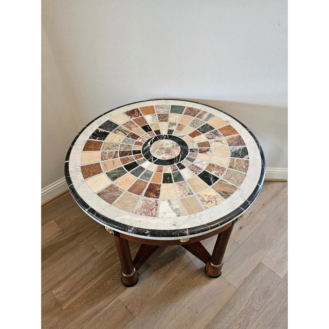 A stunning Italian Empire Grand Tour style specimen marble 'pietra dura' table. Topped with a spectacular exhibition...